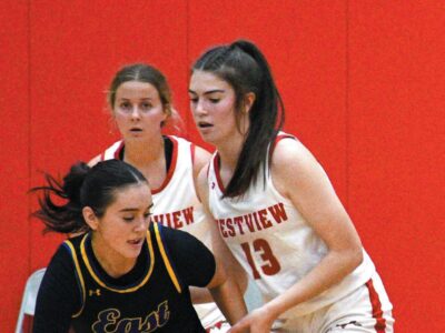 Lady Warriors split opening decisions